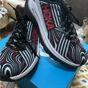 Hoka Black and White Sneakers with Red Highlights